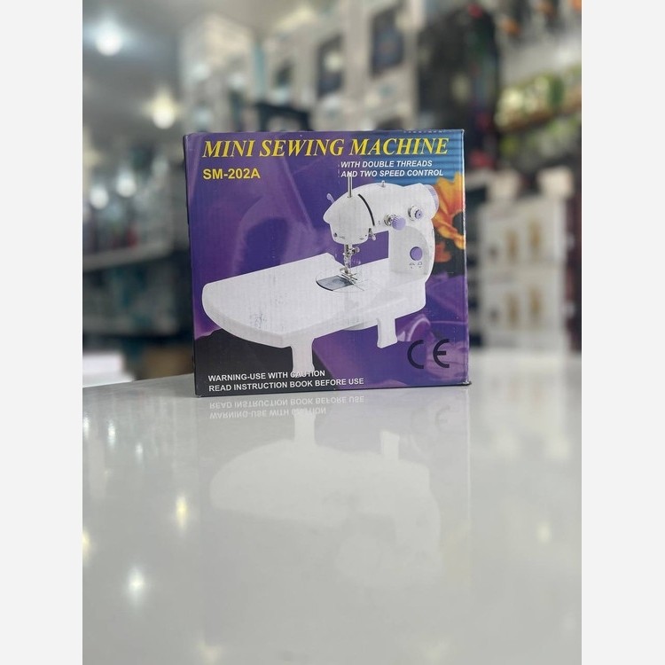 مینی چرخ خیاطی دارای میز تاشو مدل SM202A